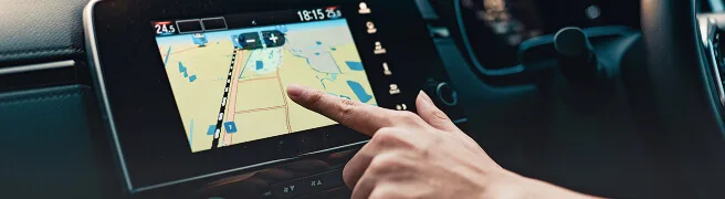 hand-using-gps-navigation-system-car-while-travel