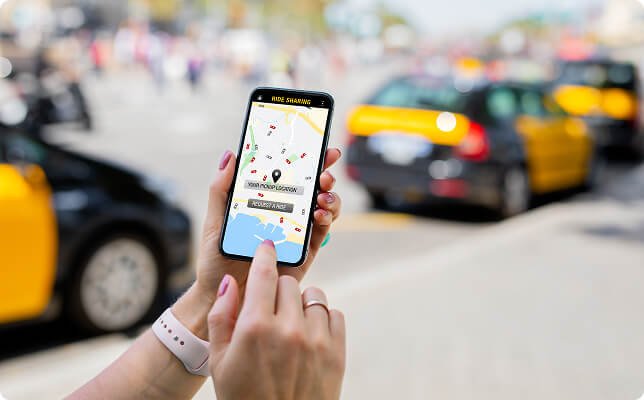 person-using-ride-sharing-app-mobile